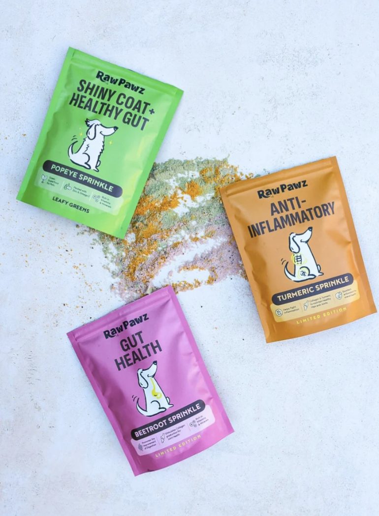 Raw Pawz sprinkle pouches with scattered powders